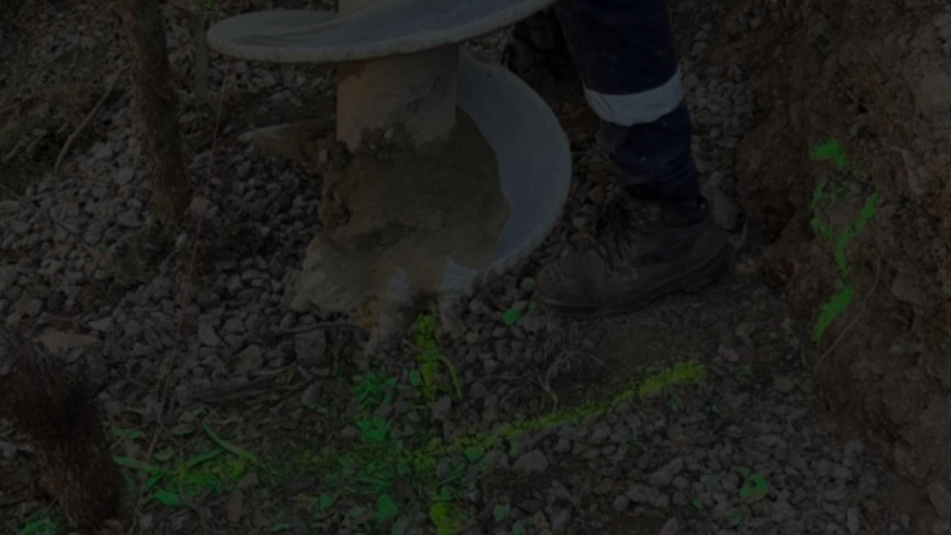 Retaining Wall Engineers Brisbane and Gold Coast â auger drilling for retaining wall foundation preparation.